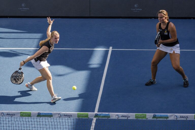woman playing padel on sunny costa del sol court