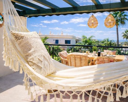 Hammock on sunny terrace