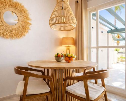 Modern living room in luxury Marbella apartment with terrace